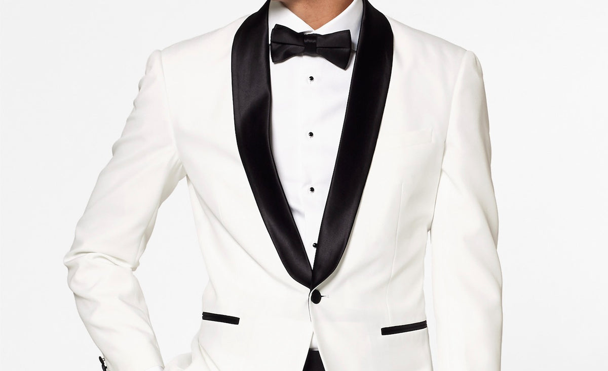 Man wearing black and white prom tuxedo
