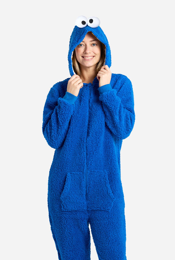 Women wearing red pluche Cookie Monster Adult onesie for women