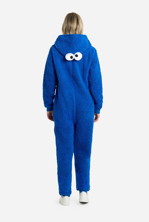 Women wearing red pluche Cookie Monster Adult onesie for women, view from the back