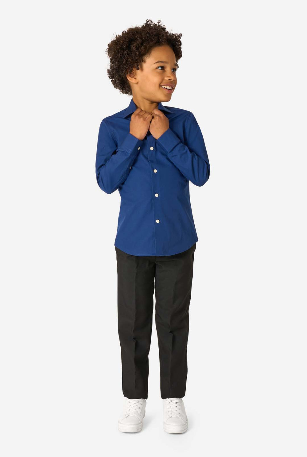 Little kid is wearing a blue shirt and a black pants.