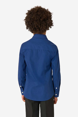 Little kid is wearing a blue shirt and a black pants. View from the back.