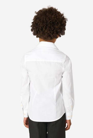 Little kid wearing a white shirt and black pants. View from the back.