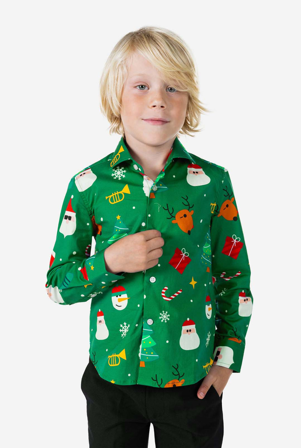Child wearing a green Christmas-themed shirt with various festive designs on a white background