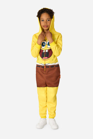 Child wearing a yellow onesie with a Spongebob character design on a white background