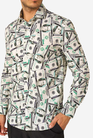 Man wearing a shirt with dollar bill pattern, close up.