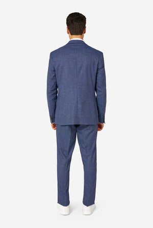 Man wearing a blue checkered suit on a white background