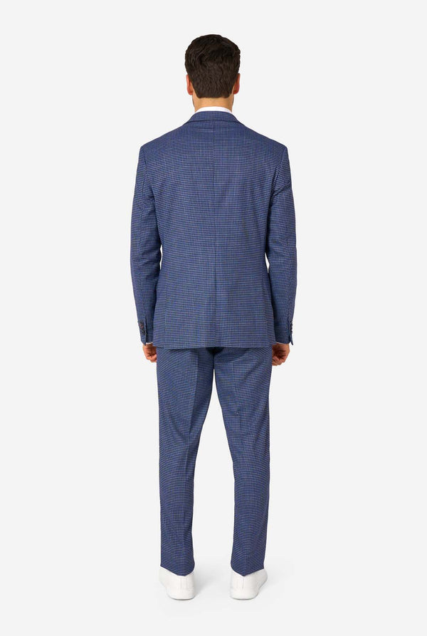 Man wearing a blue checkered suit on a white background