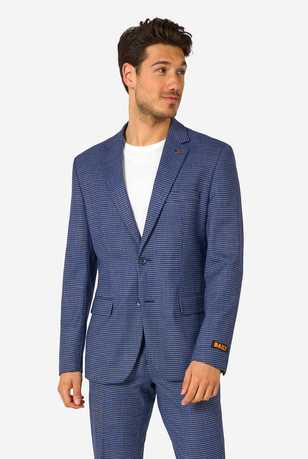 Man wearing a blue checkered suit on a white background
