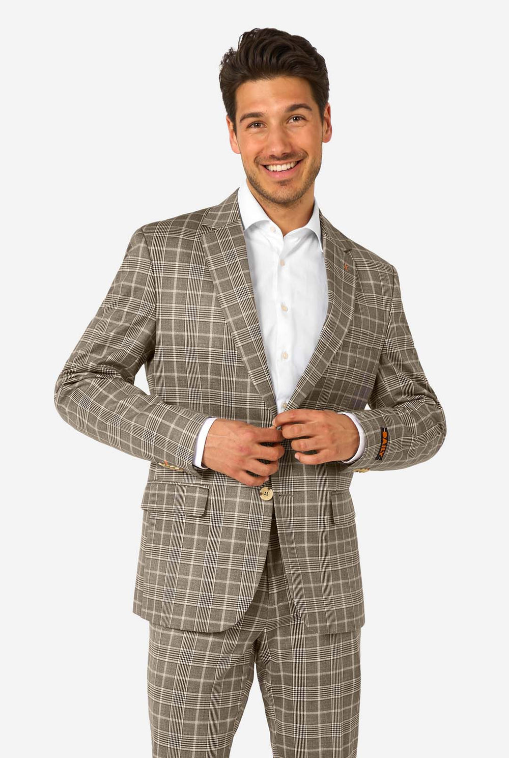 Man wearing a brown checkered suit with a white shirt on a white background