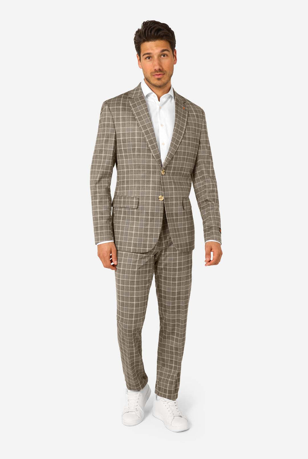 Man wearing a brown checkered suit with a white shirt on a white background
