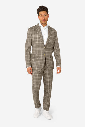 Man wearing a brown checkered suit with a white shirt on a white background