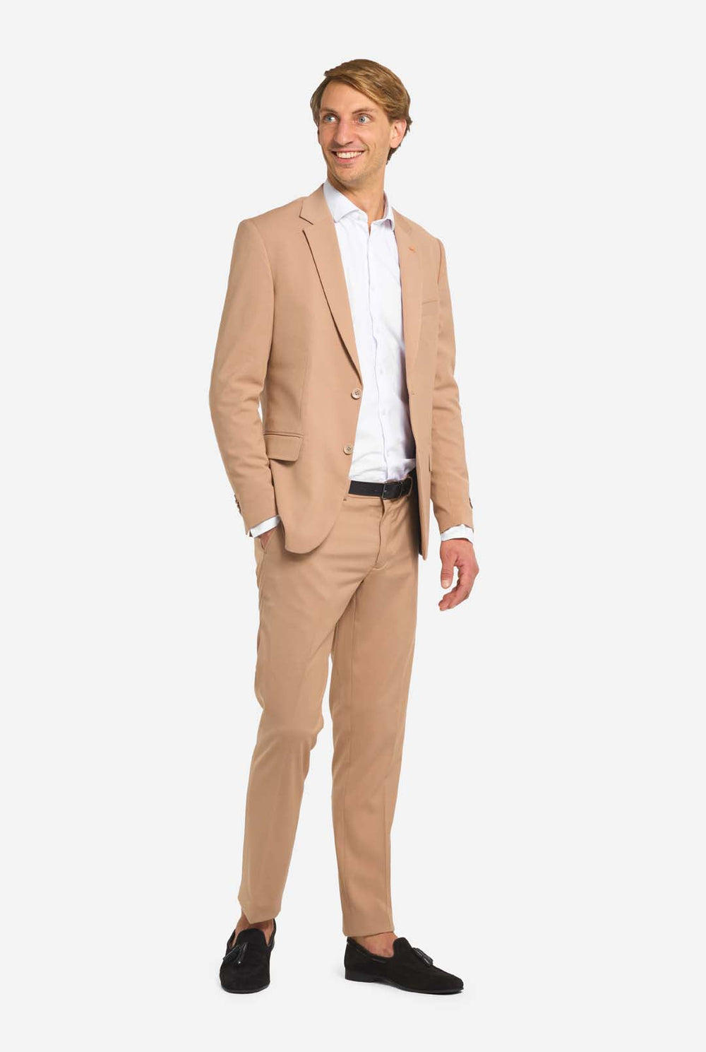 Man wearing a beige suit with a white shirt on a white background