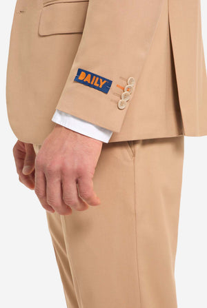 Beige suit with a visible brand label on a white background