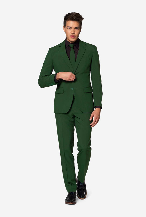 Full-body shot of man in OppoSuits Glorious Green men’s suit walking confidently — bold green formal suit for modern occasions.
