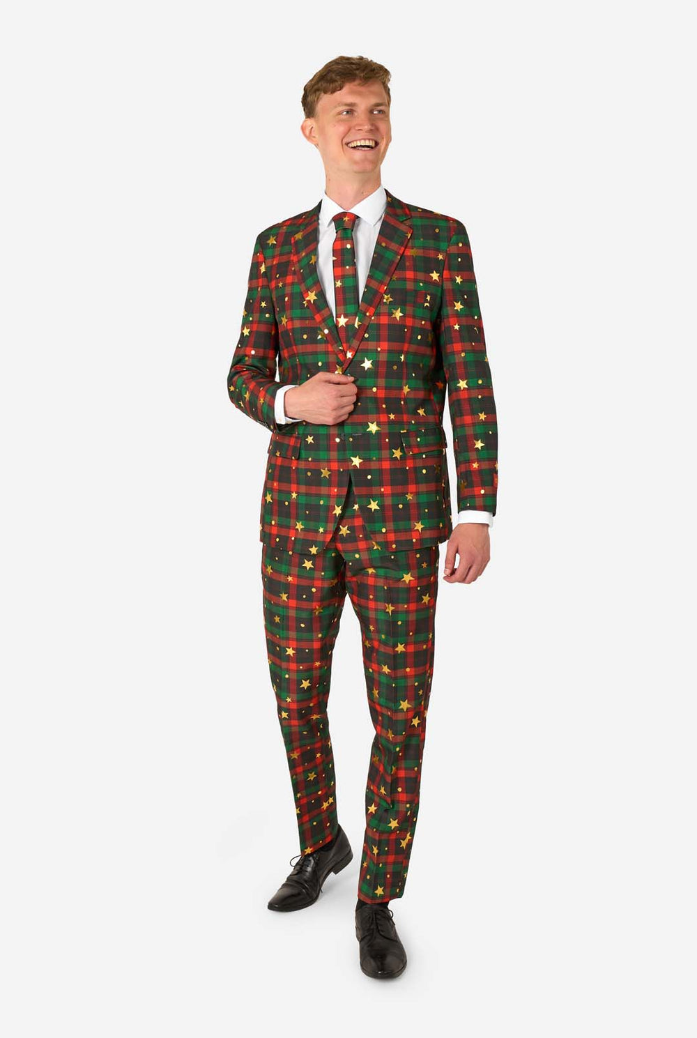Man wearing a festive plaid suit with star patterns on a white background