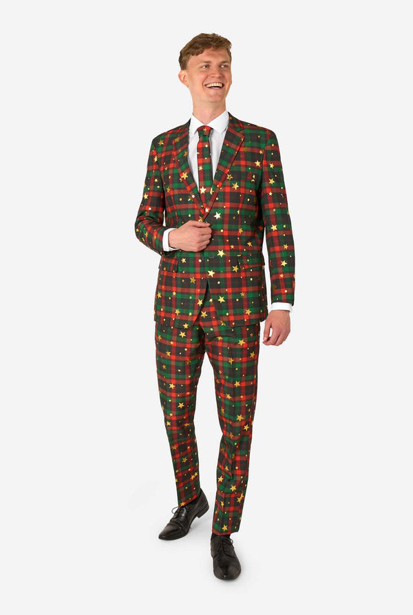 Man wearing a festive plaid suit with lights on a white background