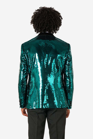 Person wearing a teal sequin jacket on a white background