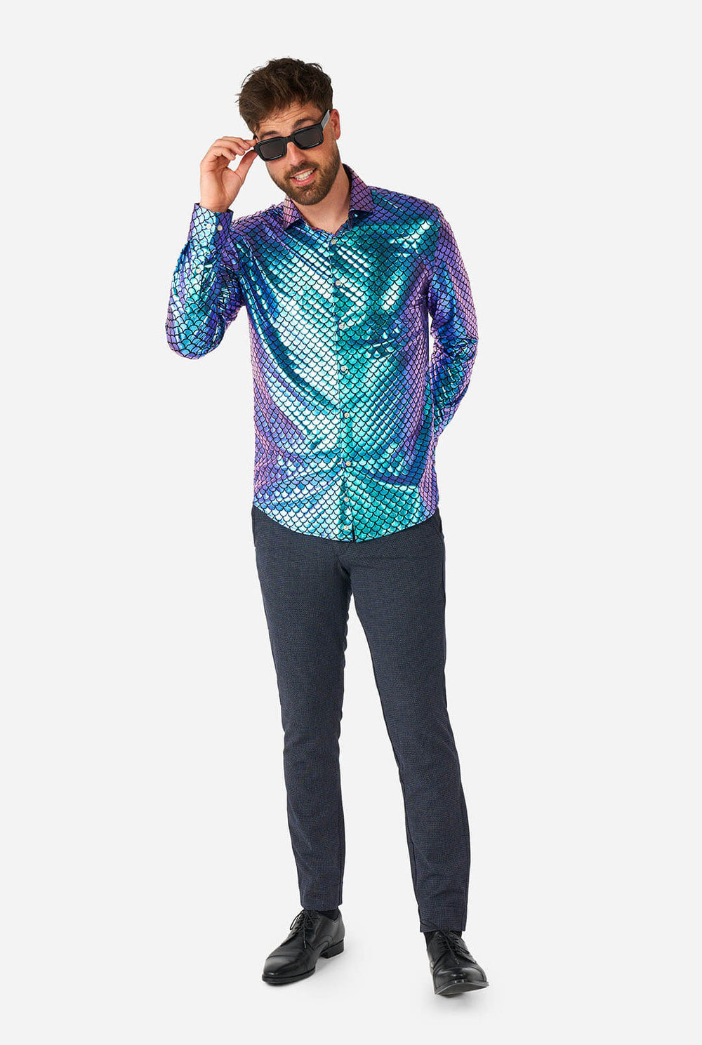 Man wearing blue fishscale print shirt