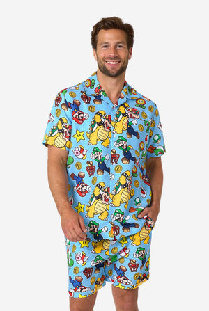 Man wearing a colorful Mario-themed shirt and shorts set on a white background