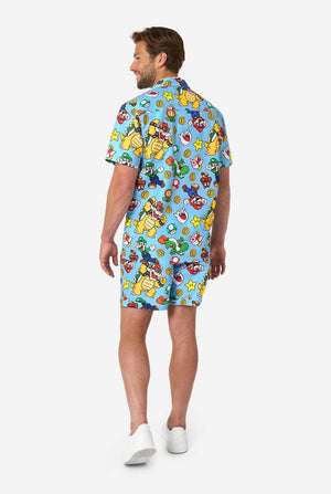Man wearing a colorful summer set with Mario character print on a white background. View from the back