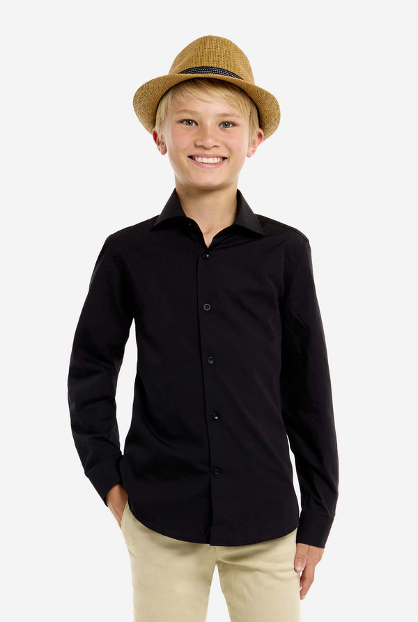 Young boy wearing a black shirt and beige hat on a white background