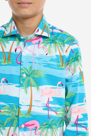 Shirt with flamingo and palm tree pattern on a blue background, close up