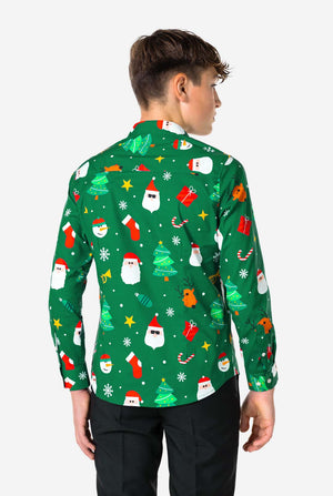 Person wearing a green Christmas-themed shirt with various festive designs on a white background