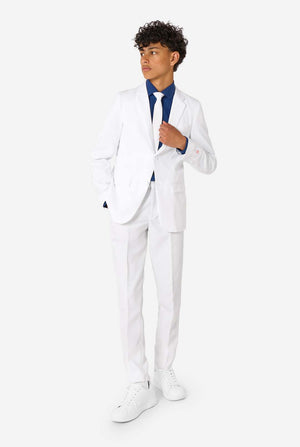 Kid wearing a white suit with a blue shirt on a white background