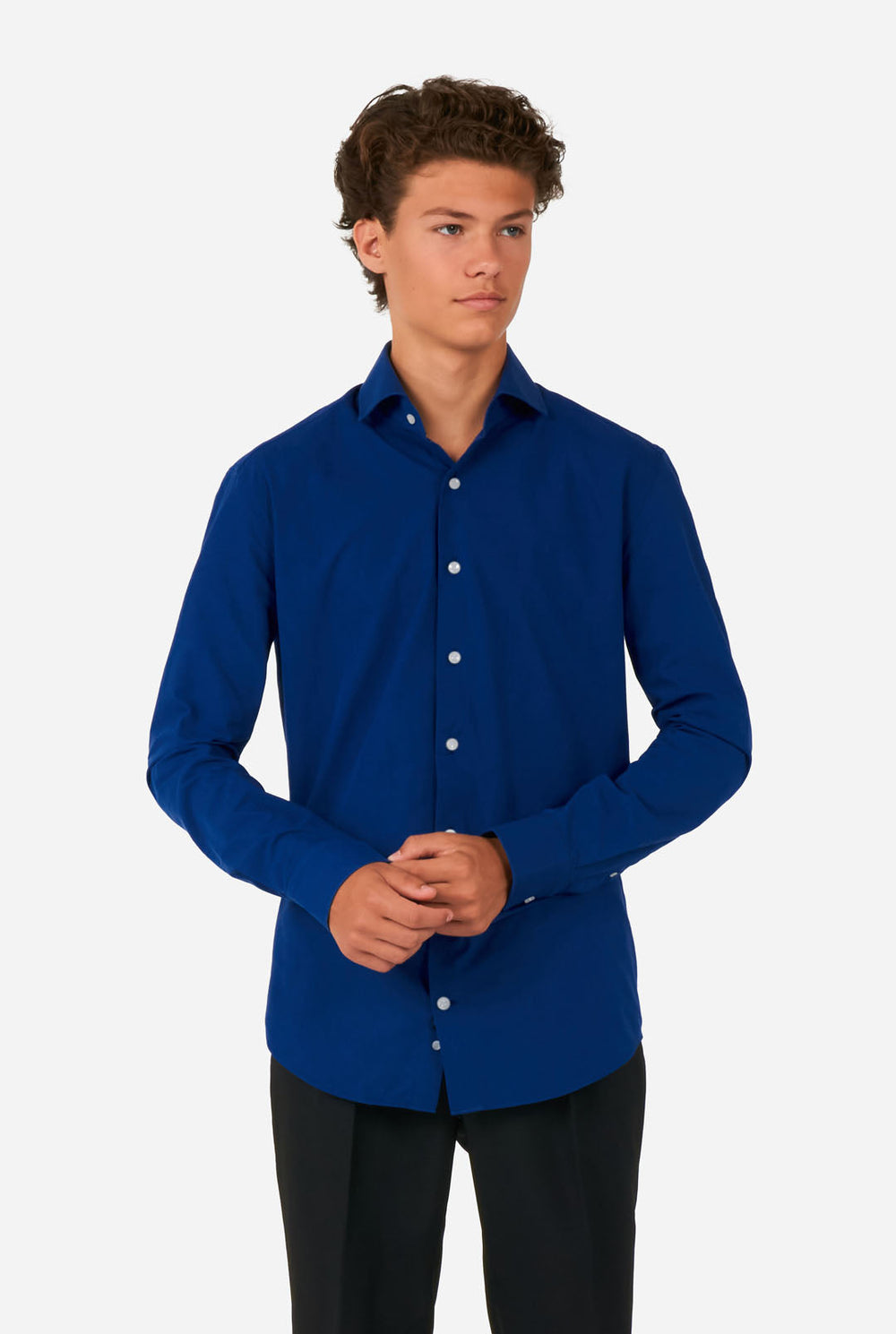 Teen wearing blue dress shirt and black pants