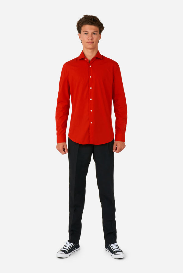Teen wearing red dress shirt and black pants