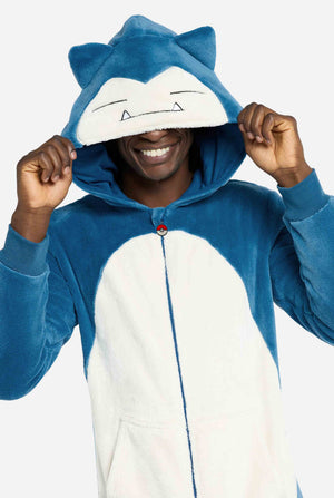 Person wearing a blue and white Snorlax-themed onesie with a hood.