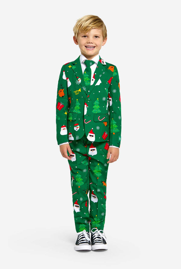 Boy wearing green Christmas suit for kids, with Christmas icons.