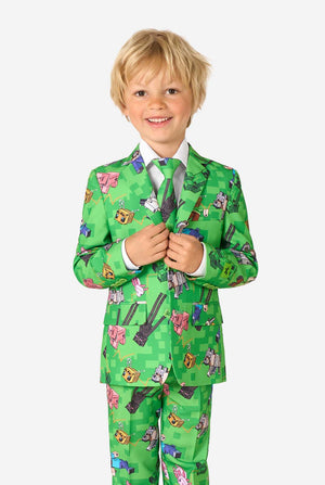 Child wearing a green suit with Minecraft print on a white background