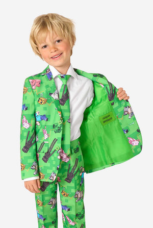 Child wearing a green suit with Minecraft print on a white background