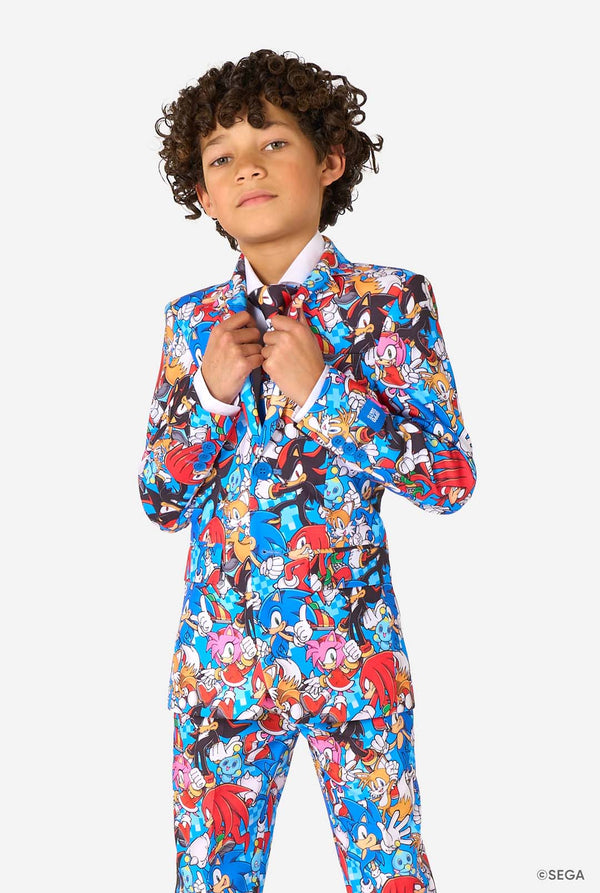 Child wearing a colorful Sonic-themed suit on a white background