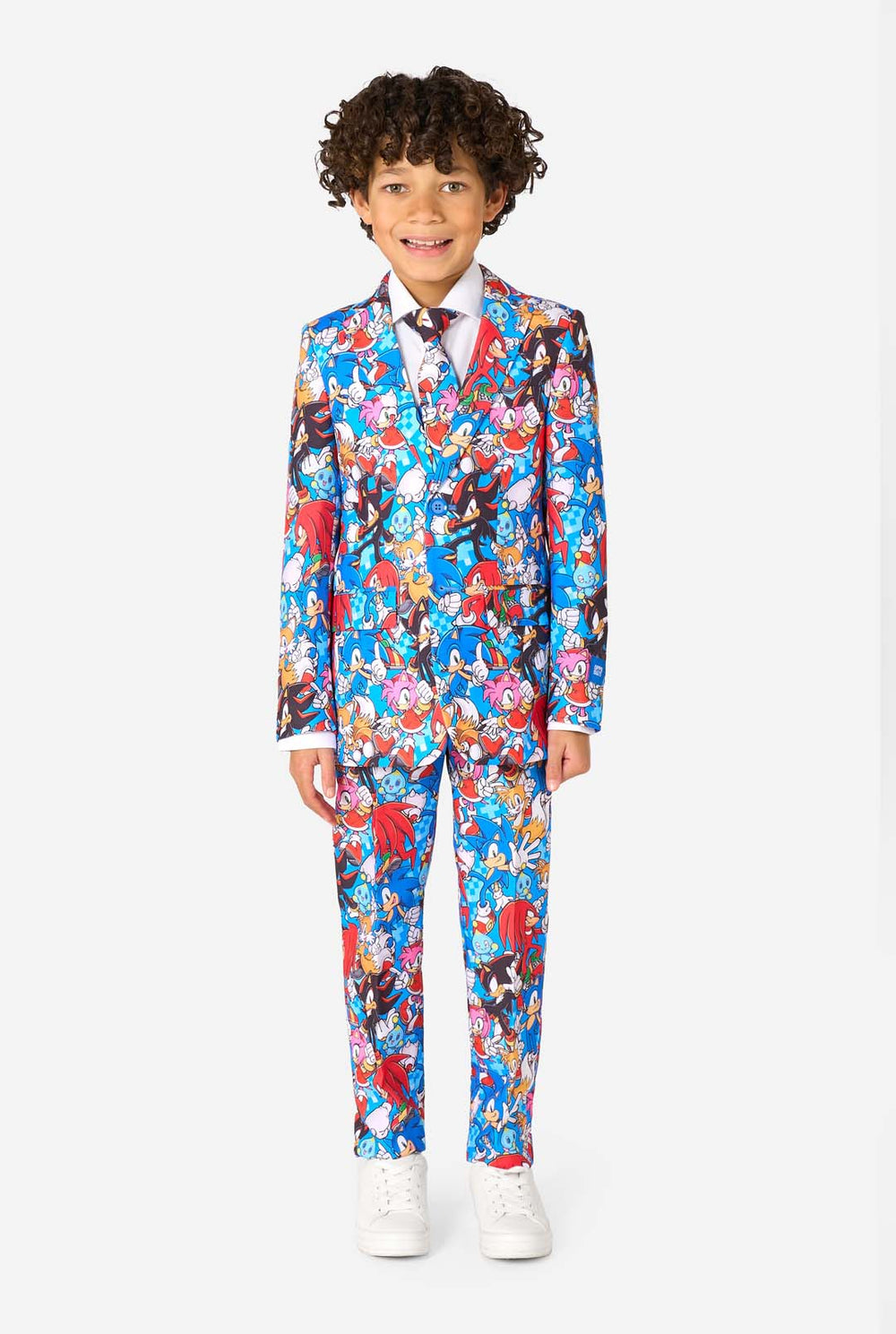 Child wearing a colorful Sonic-themed suit on a white background