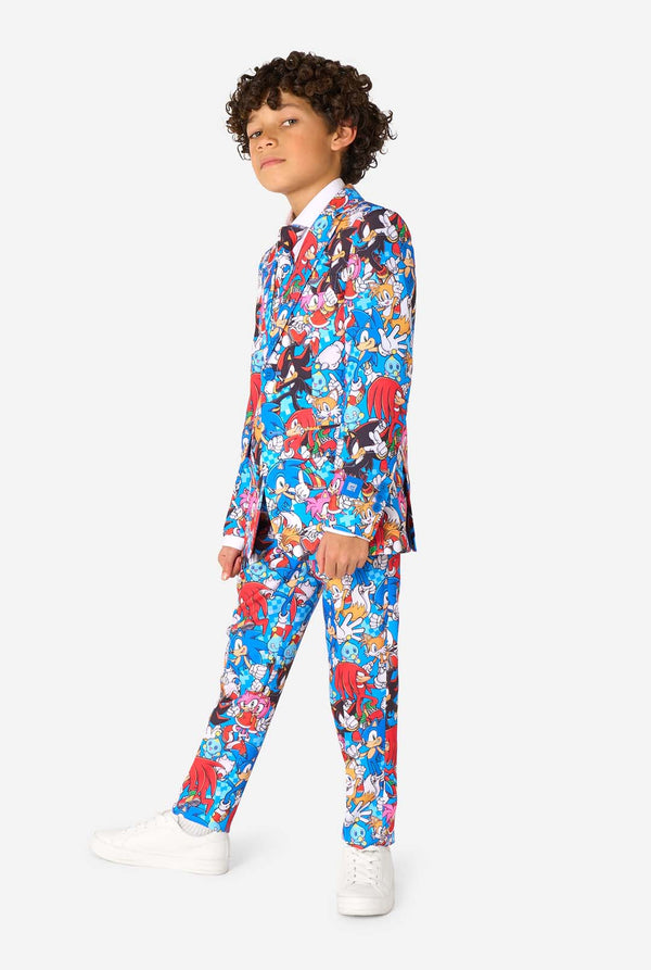 Child wearing a colorful Sonic-themed suit on a white background