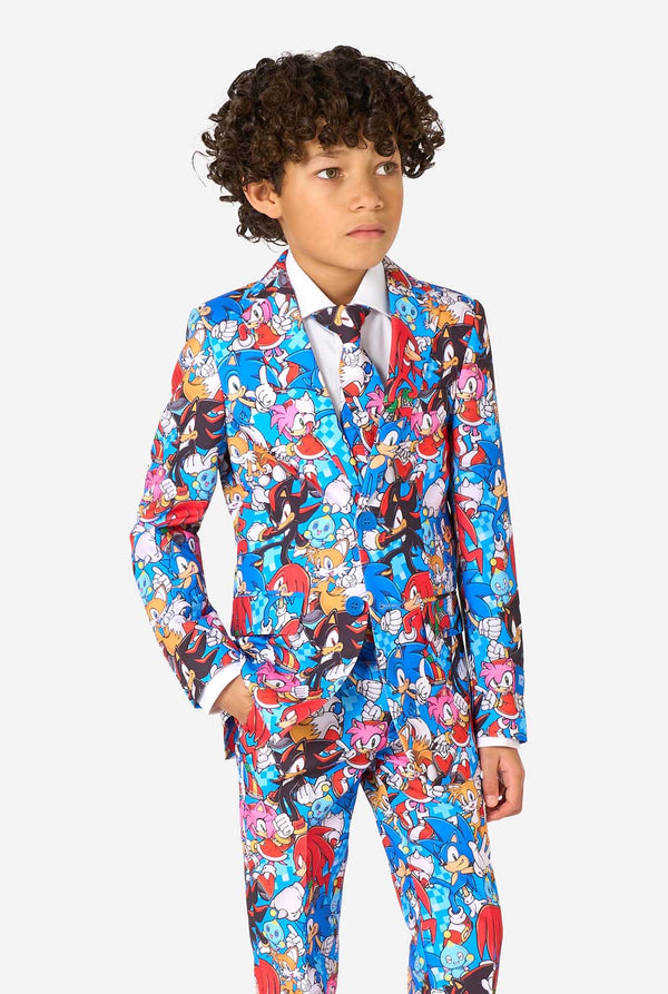 Child wearing a colorful Sonic-themed suit on a white background