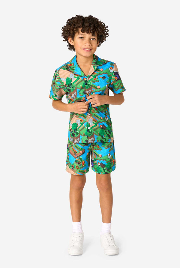 Child wearing a colorful Minecraft-themed summer set on a white background