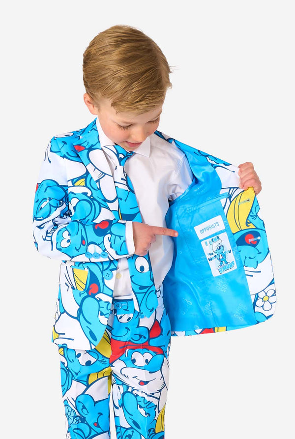 Child wearing a colorful suit with Smurf character design, showing the inside of his jacket