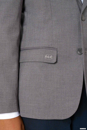 Close-up of the blazer pocket with a small embroidered Batman logo above the flap.