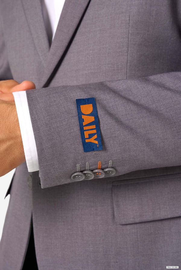 Gray suit with a visible DAILY label on the cuff