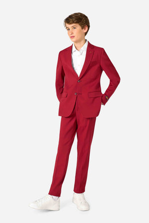 Teen boy wearing a stylish burgundy red suit with a white dress shirt, looking confidently. Perfect formal outfit for boys' special occasions, weddings, and parties. Full body image.