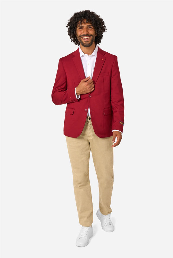 Man wearing a red blazer, white shirt, beige pants, and white shoes on a white background. Full body image