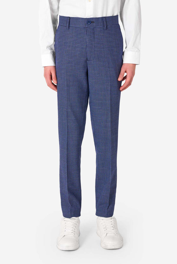 Person wearing blue checkered pants on a white background
