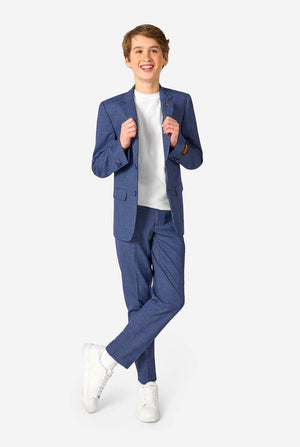 Person wearing a blue checkered suit with a white shirt and white shoes on a white background