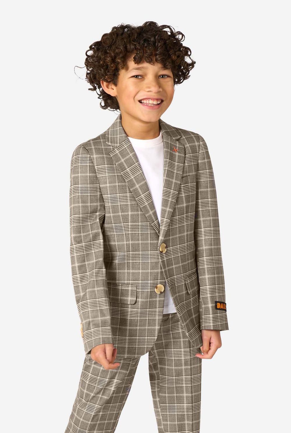 Child wearing a checkered suit with a plain background