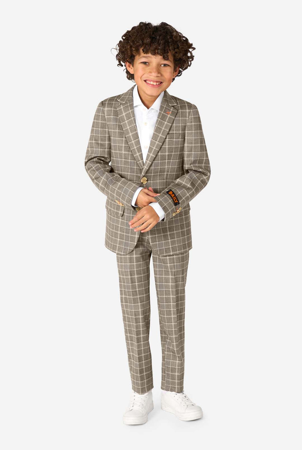 Child wearing a checkered suit with a plain background