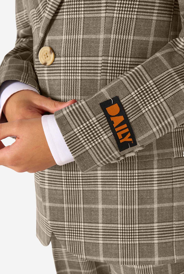 Plaid suit jacket with the DAILY label on a white background