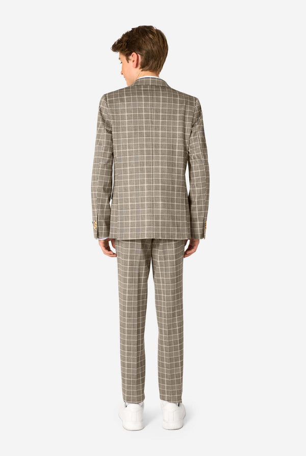 Man wearing a tan checkered suit on a white background